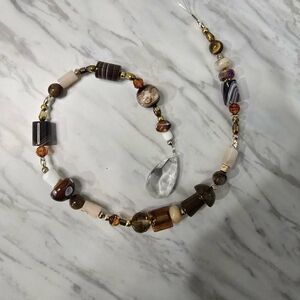Elegant Brown and Gold Beaded Suncatcher
